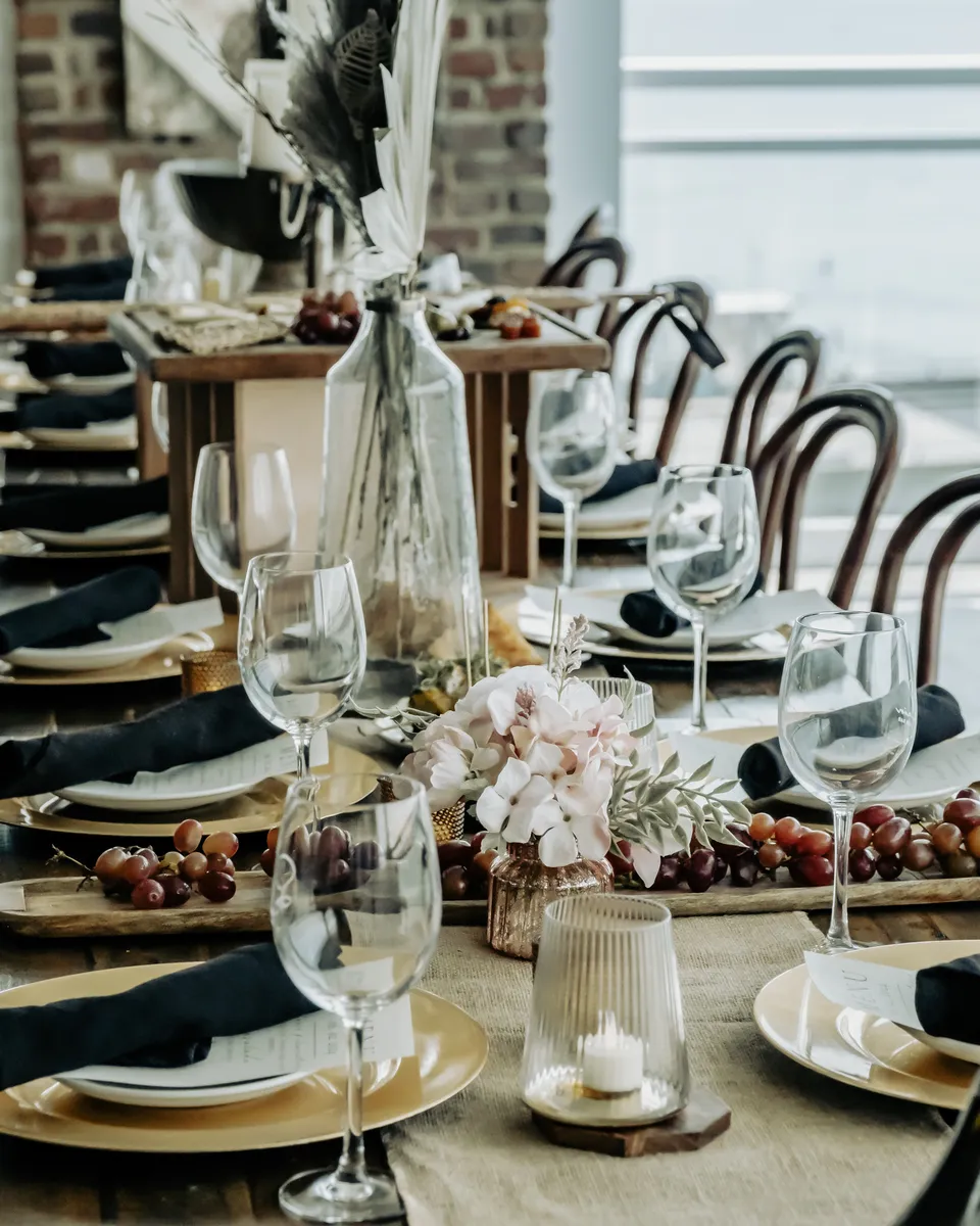 An event table setting with florals and candles